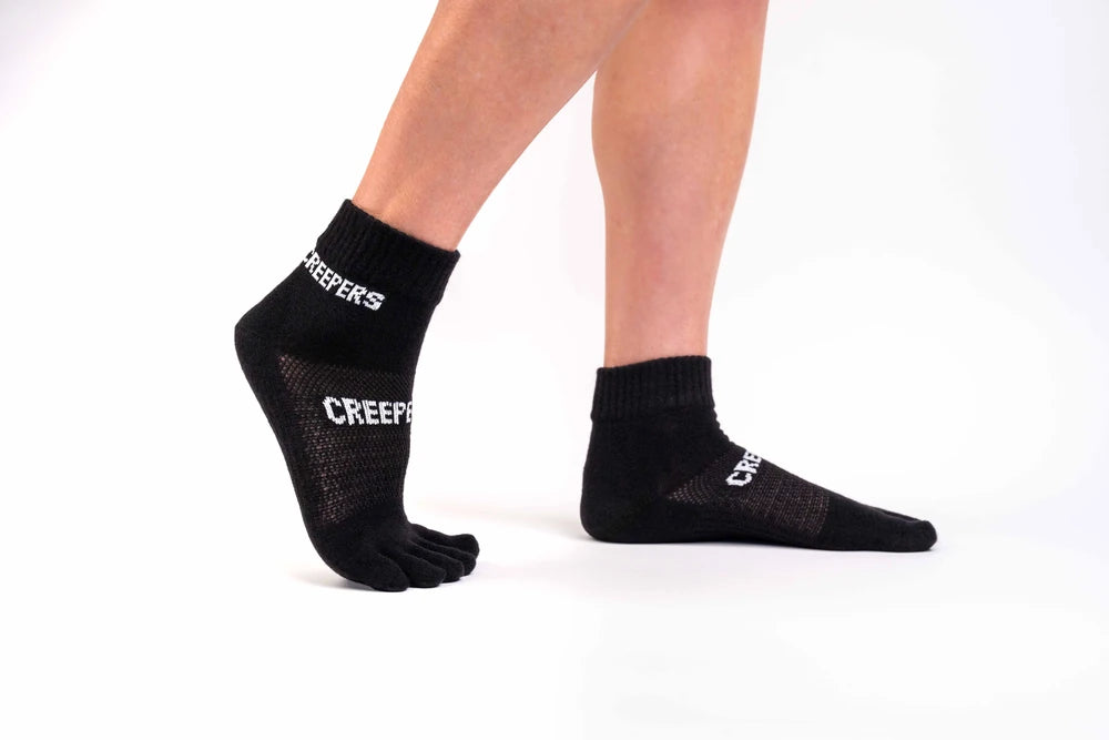 Calcetín de dedos negro Creepers con diseño ligero y altura tobillo para running y trail
