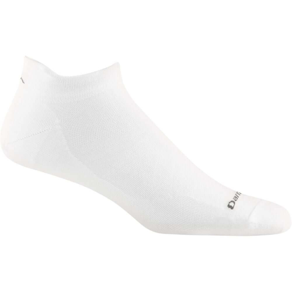 a white banana is sitting on a white surface