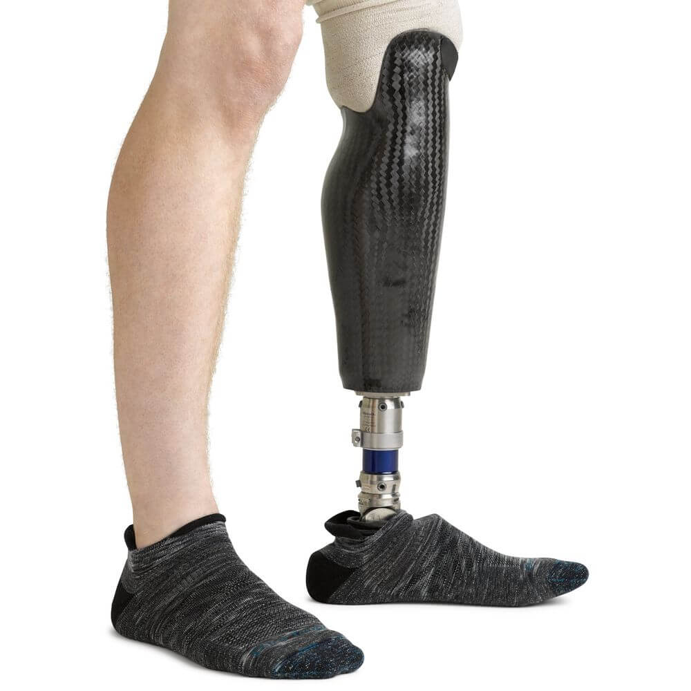 a person is standing on a bench with a skateboard