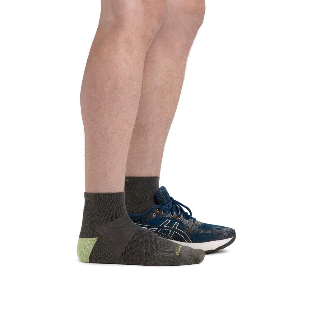 a person is standing on a bench with a skateboard