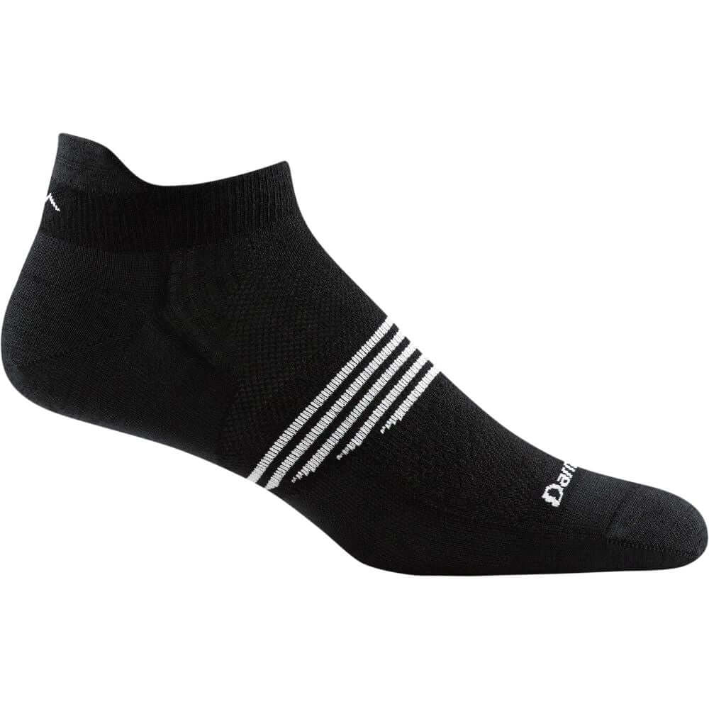 a black and white photo of a black shoe