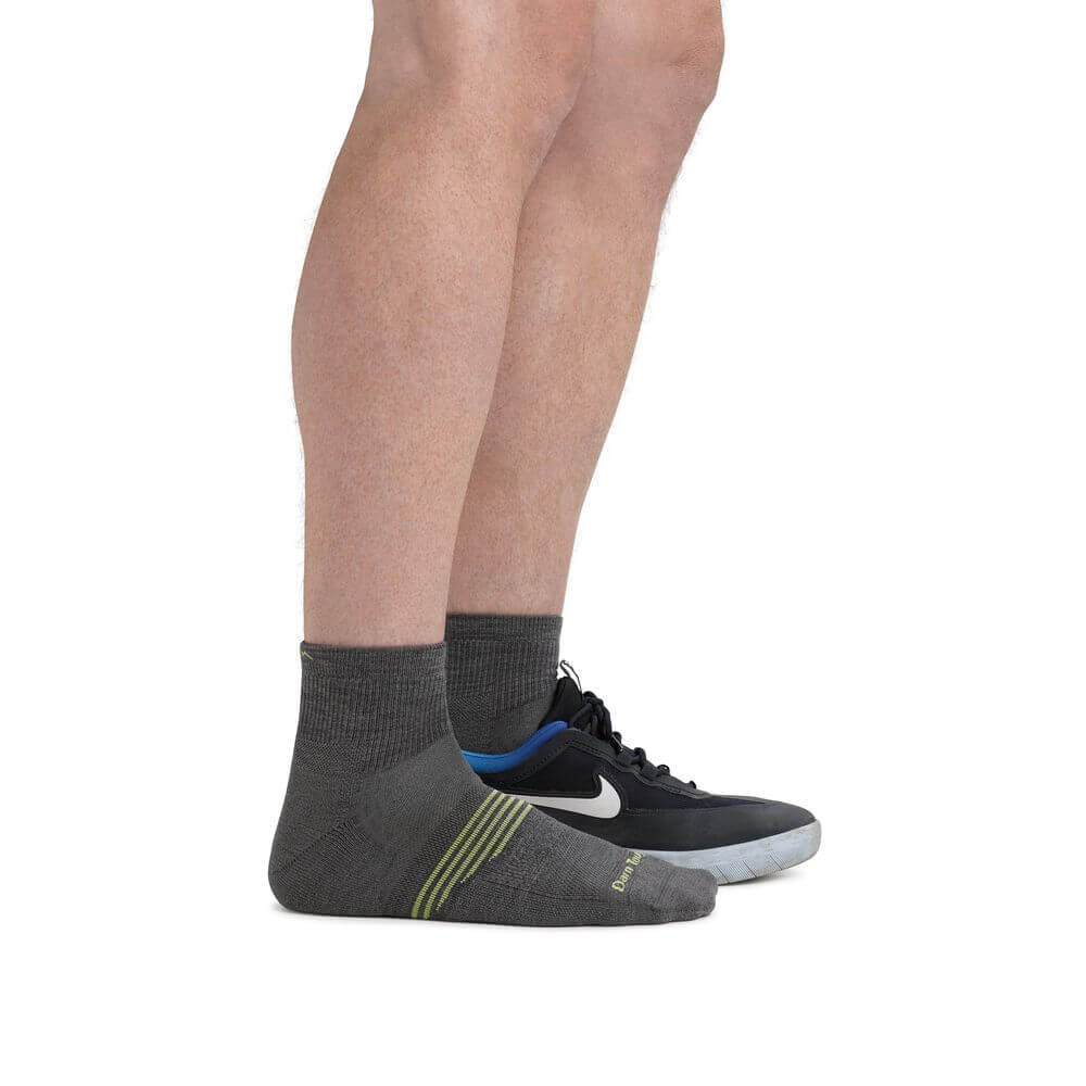 a person is standing on a tennis court