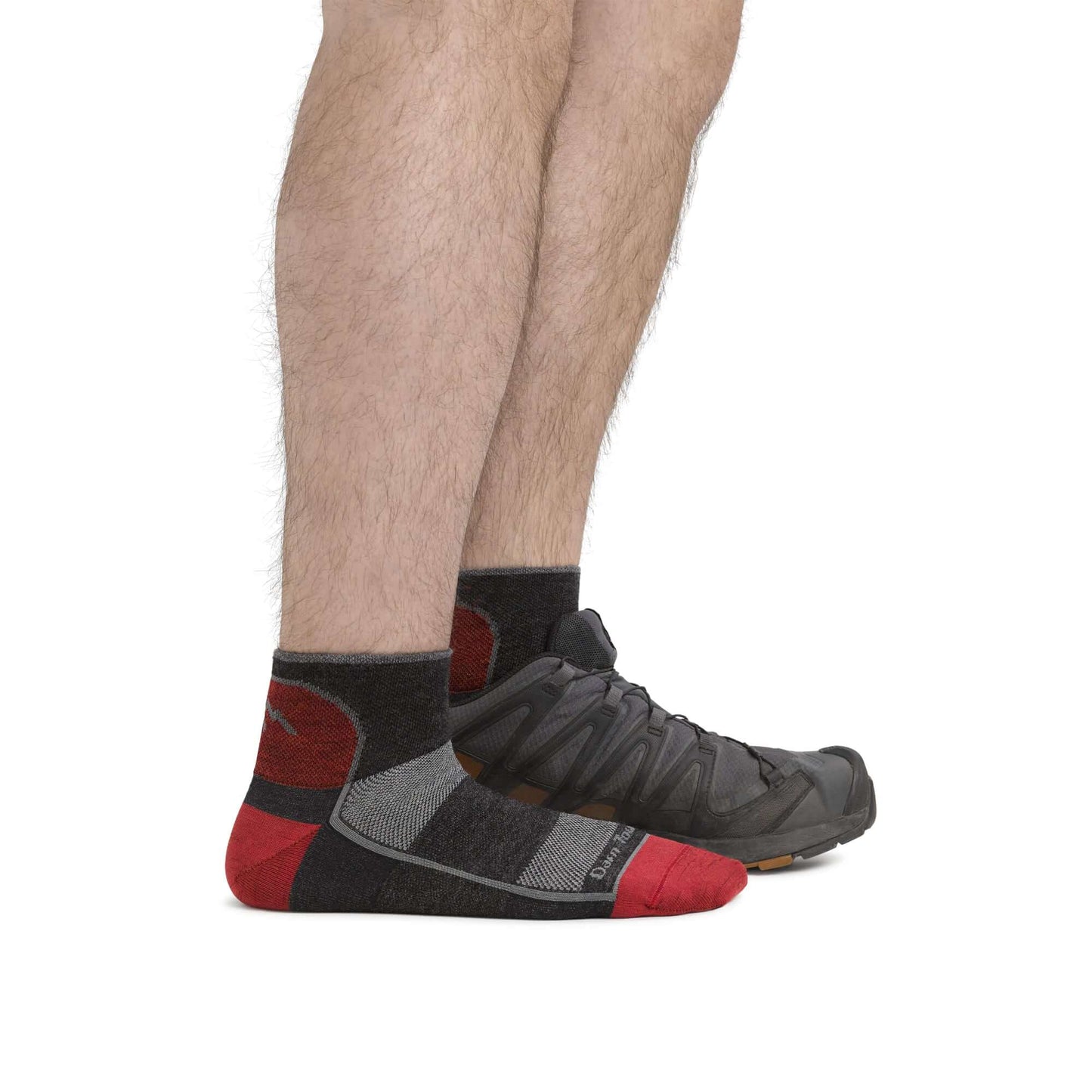 a person is standing on a bench with a skateboard