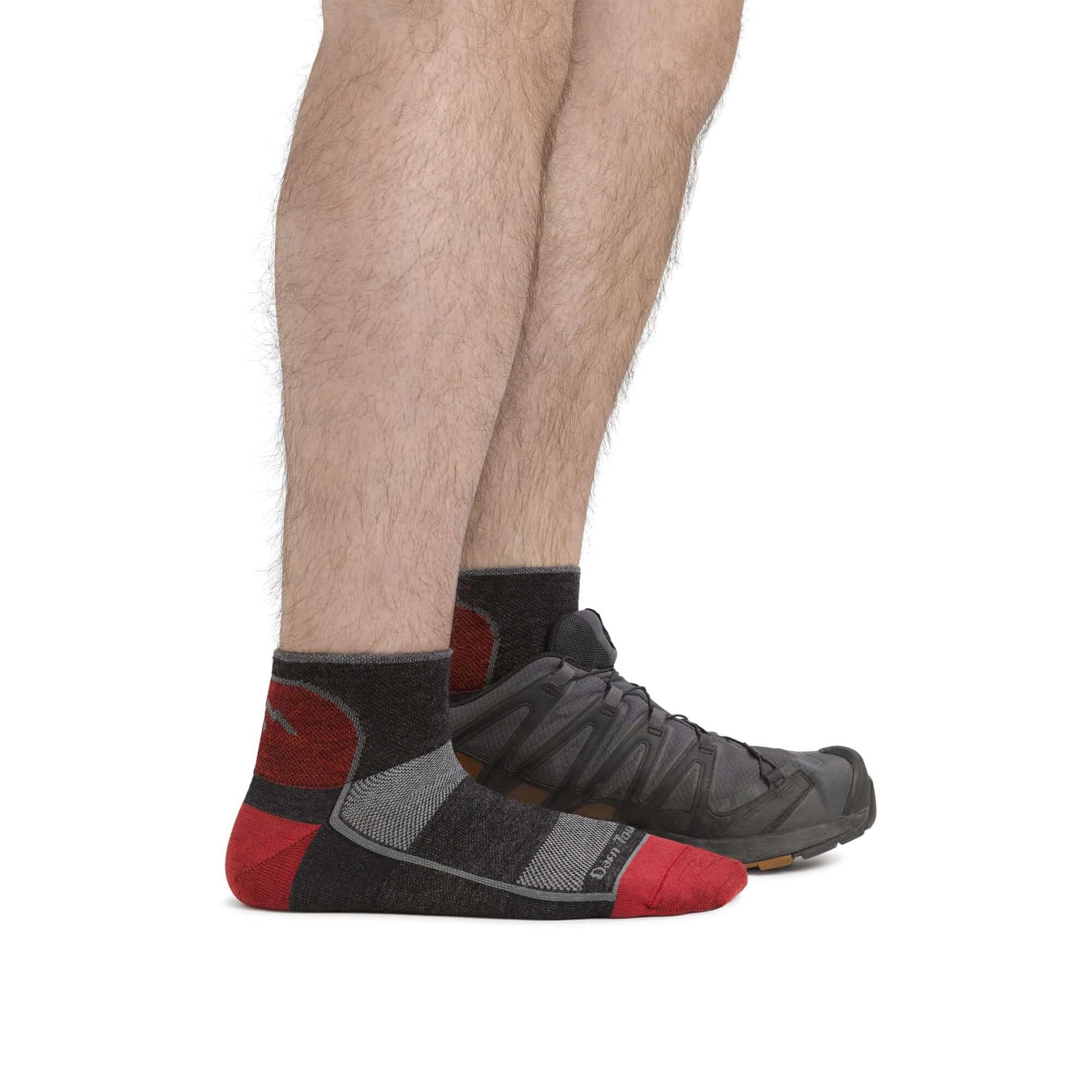 a person is standing on a bench with a skateboard