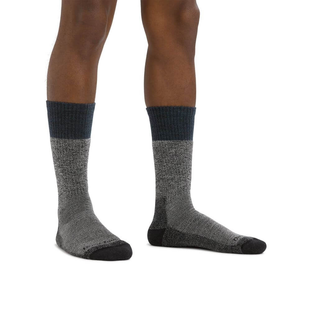 a close up of a person wearing a pair of shoes