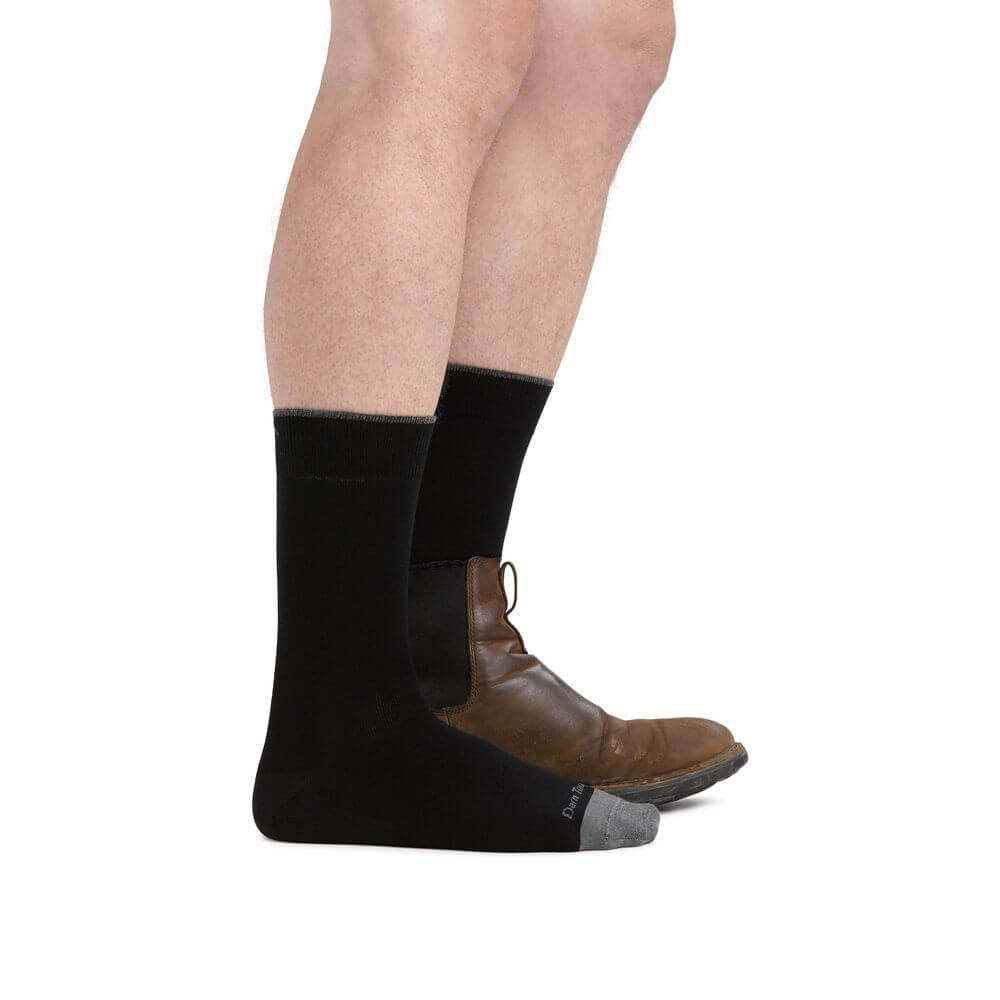 a close up of a person wearing a skirt