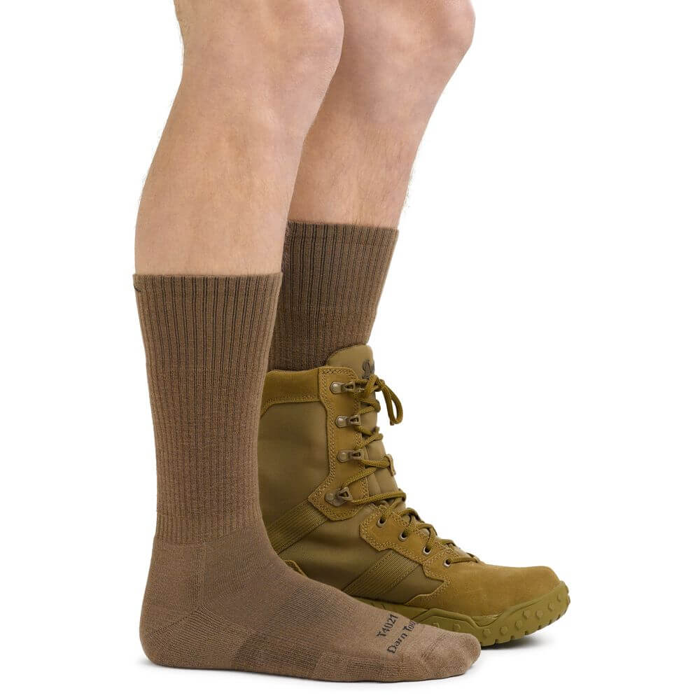 a close up of a person wearing a tennis shoes