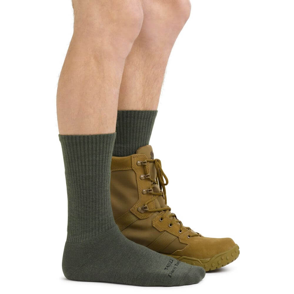 a person wearing a pair of shoes on a bench