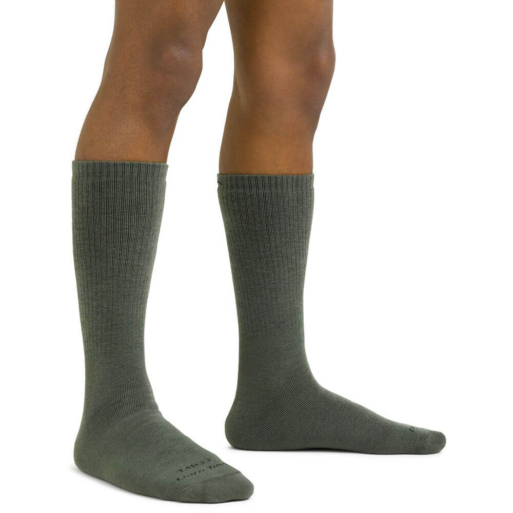 a close up of a person wearing tennis shoes