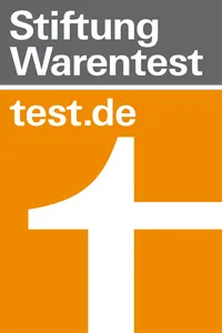 Logo de Stiftung Warentest con el texto "test.de" en un fondo naranja y gris.